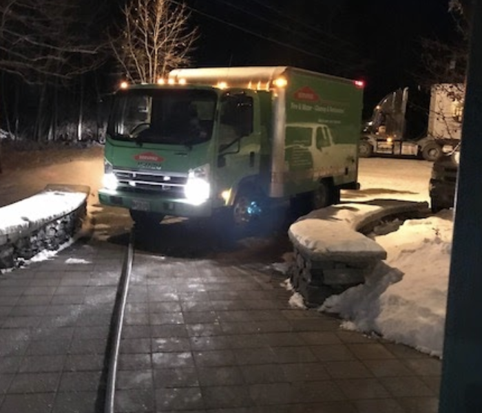 SERVPRO green van on the way to another job at night