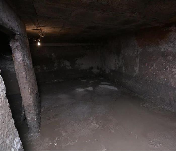 the old dirty cellar flooded from a pipe break