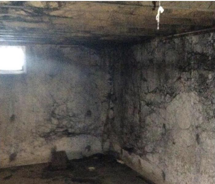 A room with soot and fire damage